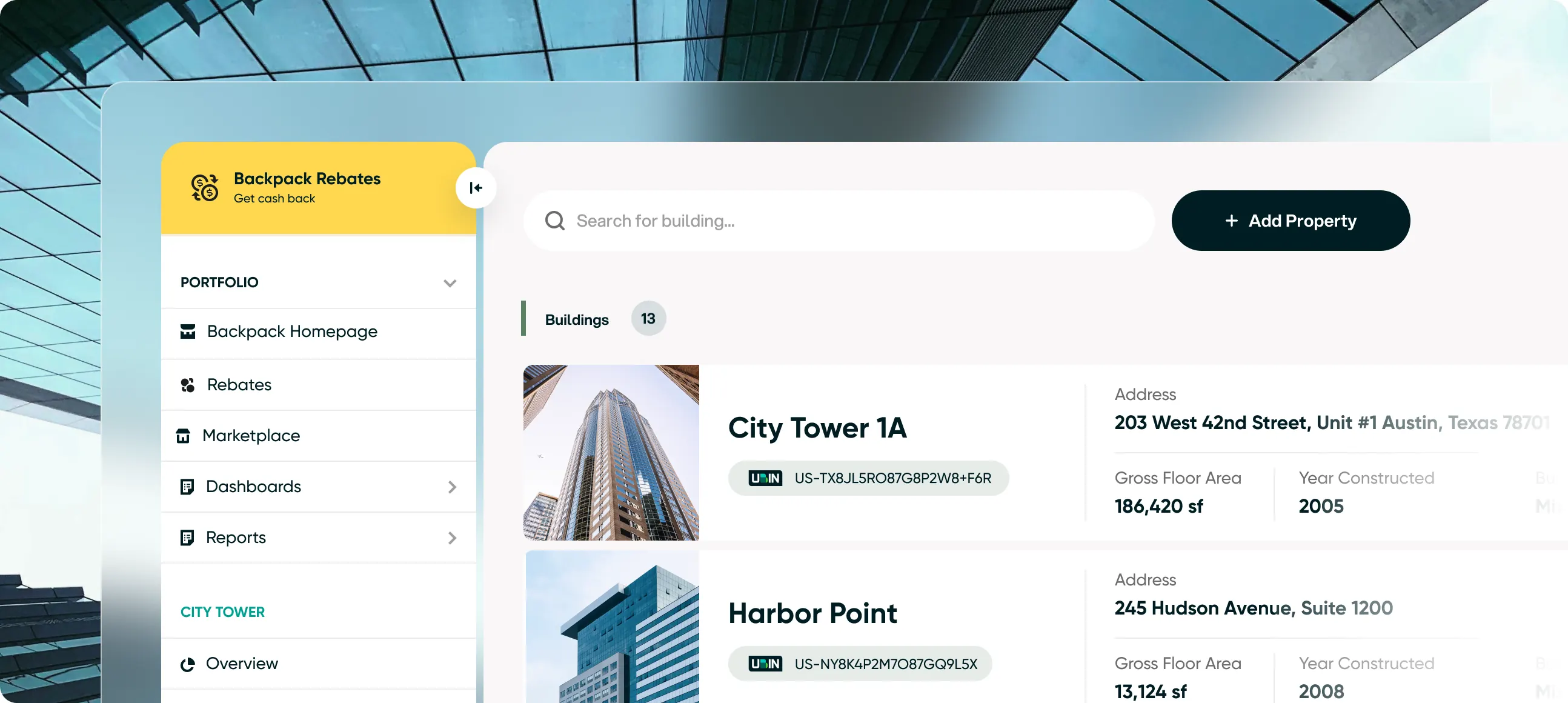 The Backpack portfolio view, listing City Tower 1A and Harbor Point with their UBINs, addresses, floor areas and years built